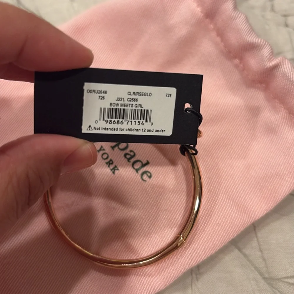 Rose gold Kate Spade bracelet with bow on top. Never used. Tag included. - Picture 4 of 4